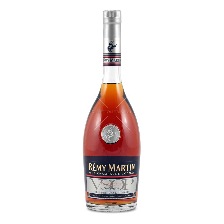 Remy Martin V.S.O.P 70cl bottle with fine champagne cognac, vibrant gold color.
